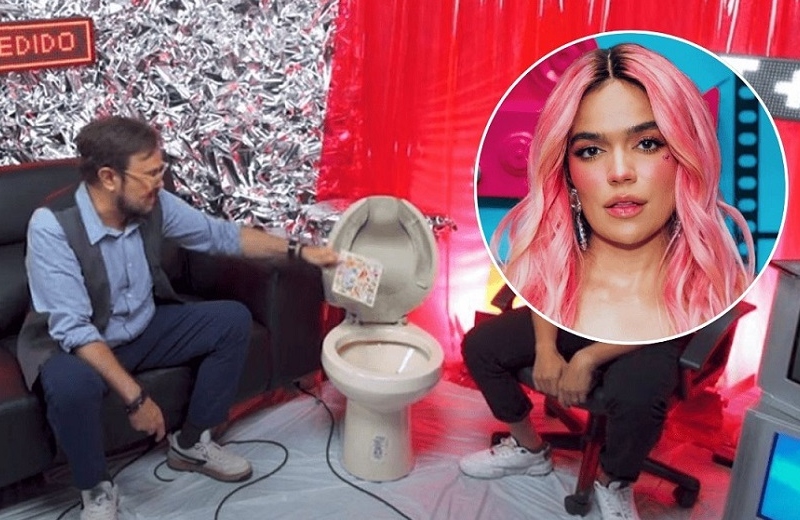 ¡Trakaaa! Aleks Syntek tira al inodoro disco de Karol G (+foto/video)